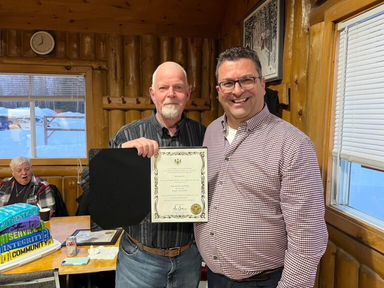 Residents and volunteers honour Food Bank chairman Rick Bartlett