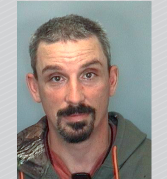 Police officer shot during manhunt